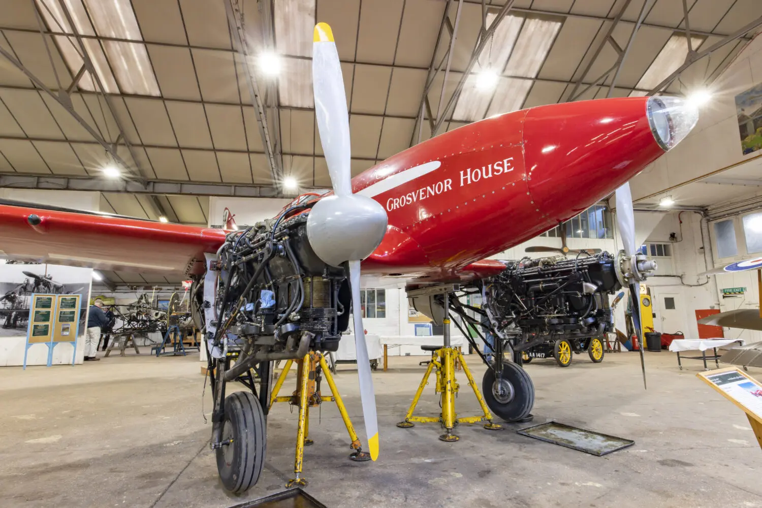 An aircraft being repaired in a hangar